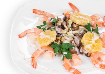Shrimp salad with mushrooms close up.