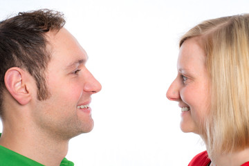 young couple looking in her eyes