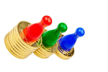 Spielfiguren auf Münzen