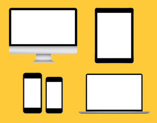 Monitor, tablet, laptop and two smartphones on yellow background