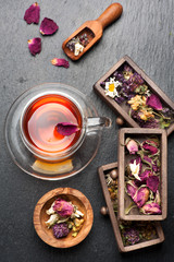 herbal tea and dried herbs and flowers. top view