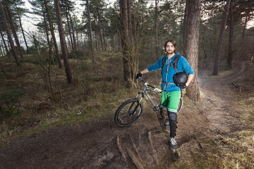 Obraz premium ATB cyclist in the woods