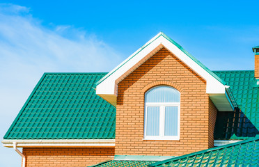 house with a gable roof window