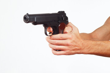 Hands with semi-automatic gun on a white background