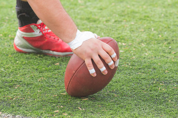 American football player passing the ball