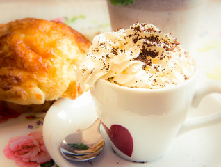 cup of coffee with muffin a