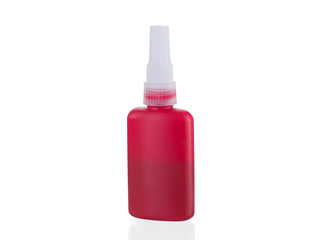 Red glue bottle isolated on white background