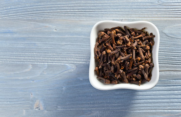 cloves on wooden table