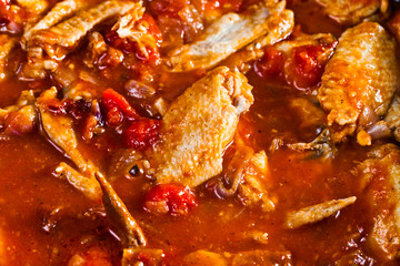 Stewed chicken in tomato sauce
