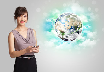 Young woman with earth and cloud concept