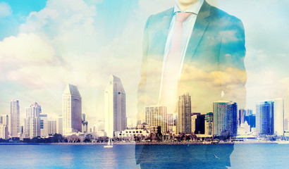 Double exposure of city and business man