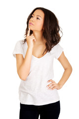 Fototapeta premium Beautiful young thoughtful woman.