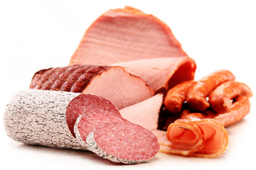 Meat products including ham and sausages isolated on white