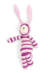 Funny knitted rabbit toy showing left direction