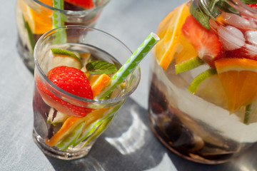 Refreshing white sangria (punch) with fruits, picnic idea