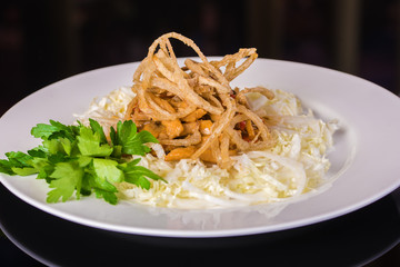 Chinese cabbage and onion salad close up