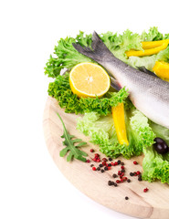 Composition of fresh seabass and vegetables.