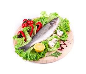 Composition of fresh seabass and vegetables.