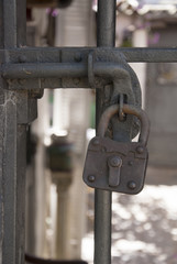 Security Device - Fence Secured With A Vintage Padlock