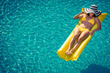 Young woman in swimming pool