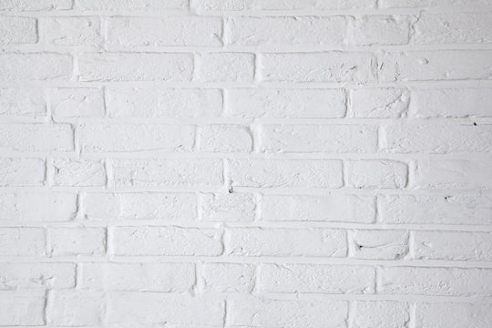 part of white painted brick wall