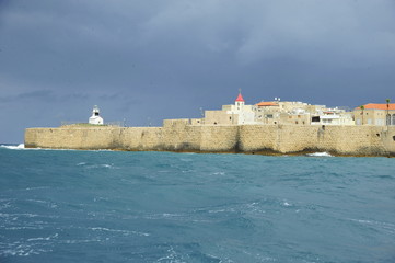 The walls of the old Acre port fortress and St. John Church