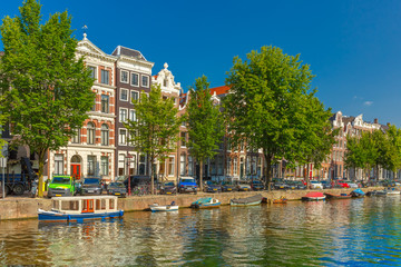 Fototapeta premium Amsterdam canals and typical houses, Holland, Netherlands.