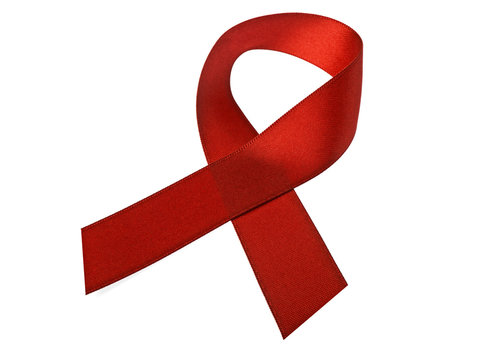Red AIDS awareness ribbon isolated on white background