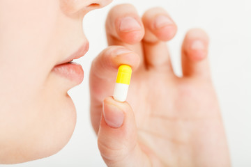 woman takes pilule