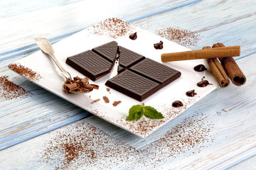 Dark chocolate on white plate