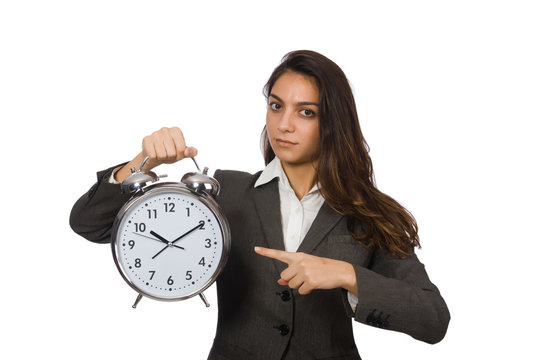 Businesswoman with clock missing her deadlines