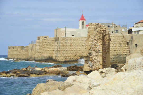 The walls of the old Acre port fortress and St. John Church
