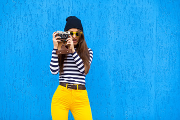 Outdoor fashion closeup portrait of nice pretty young woman