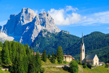 Fototapeta na wymiar View of Pian village with church in Dolomites Mountains, Italy