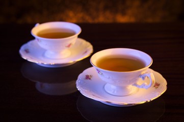 Old-style image with two cups of tea