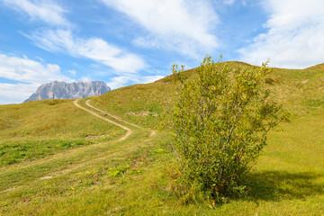 Hiking path in Dolomites Mountains near Passo Gardena, Italy