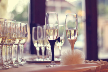 Elegant champagne glasses on table