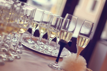 Elegant champagne glasses on table