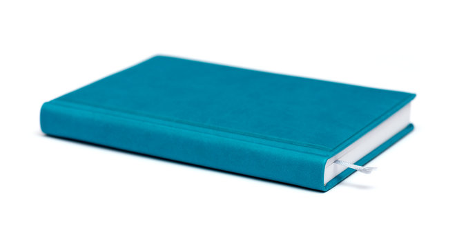 isolated blue notebook on white