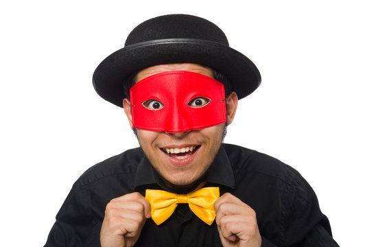 Young man in black costume and red mask isolated on white