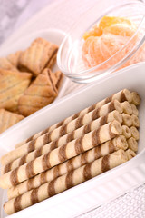 sweet cake on white plate with lemon