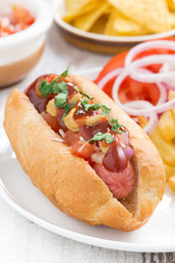 hot dogs with French fries, close-up, vertical