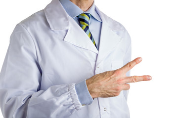 Man in medical coat making peace gesture