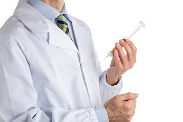 Man in medical coat holding syringe full of pills