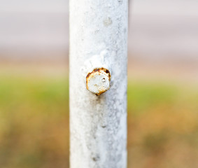Close up of a rusty bolt.