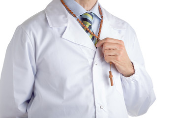 Man in medical coat wearing Rosary beads necklace