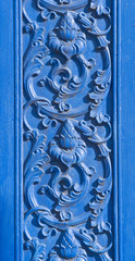 Detail of a ornamented entrance in blue color