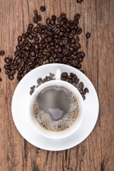 Coffee cup and saucer on a wooden table