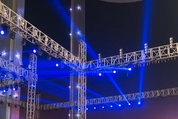 Fototapete Licht und Schatten multiple spotlights on a theatre stage lighting rig