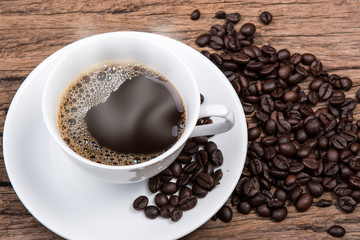 Coffee cup and saucer on a wooden table